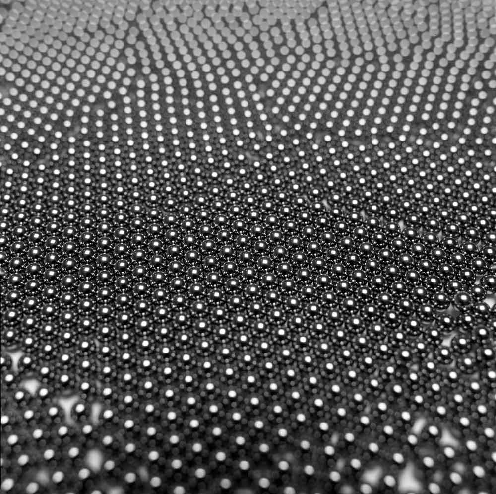 Frequented Etherics Spherics And Bars: close-up of steel balls