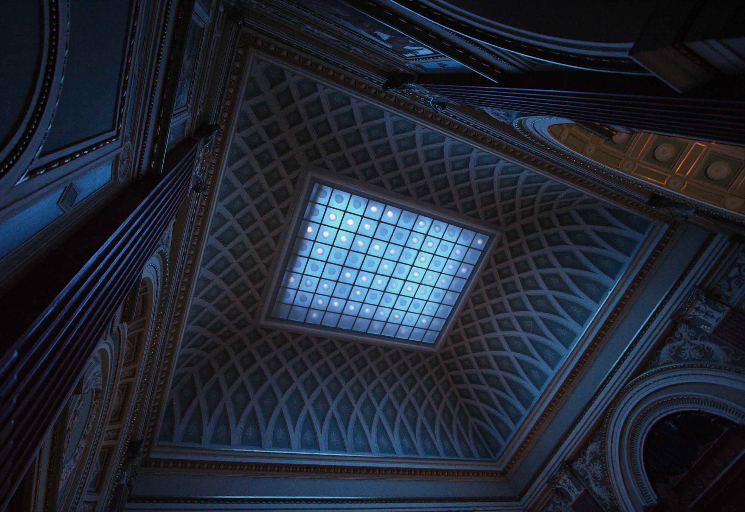 Constellation: artwork on ceiling in cold blueish light