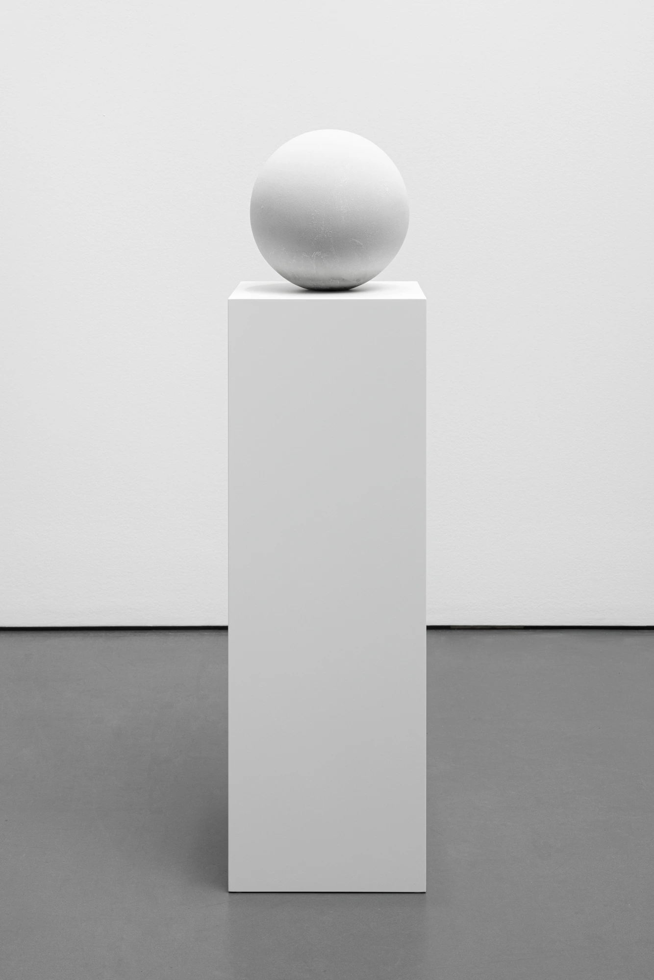 Frozen Sphere; sphere on pedestal covered with frozen dew