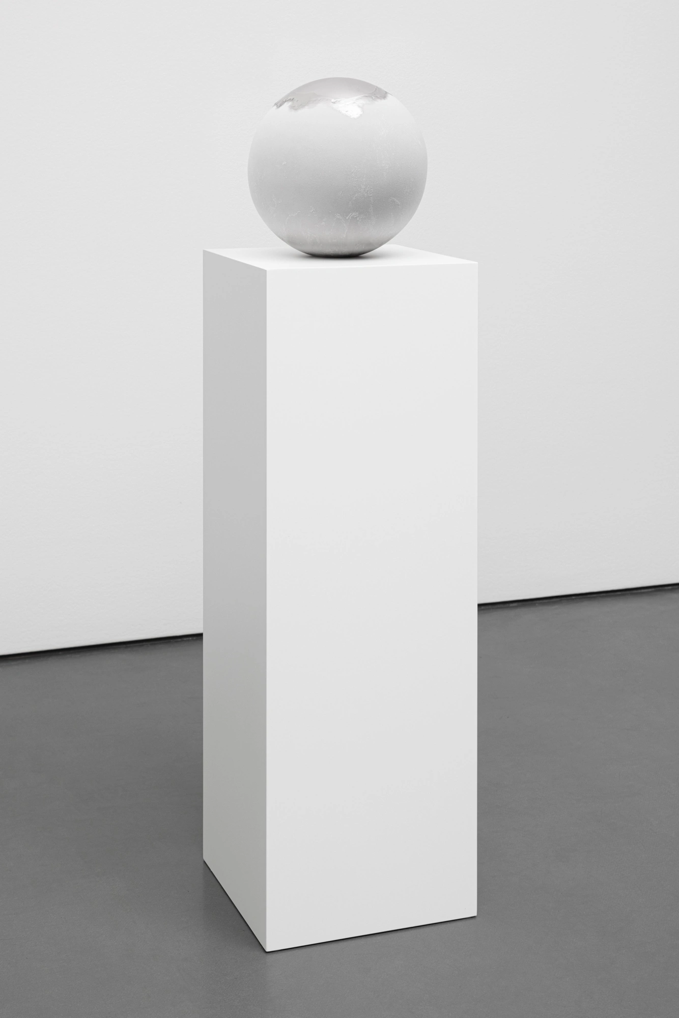 Frozen Sphere; sphere on pedestal with frozen dew melting from top