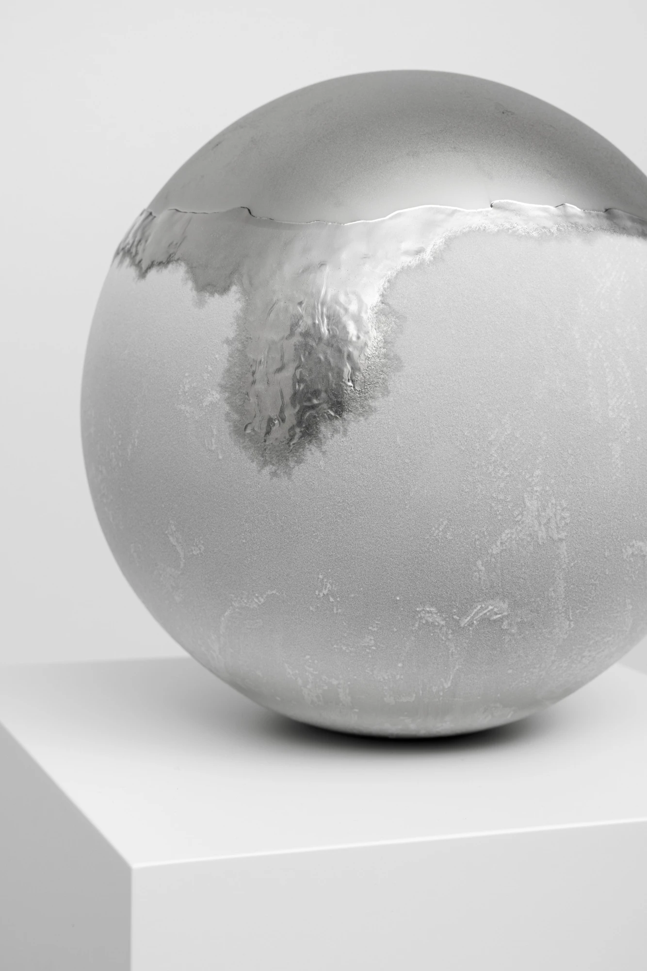 Frozen Sphere; close-up of sphere with halfway melted frozen dew