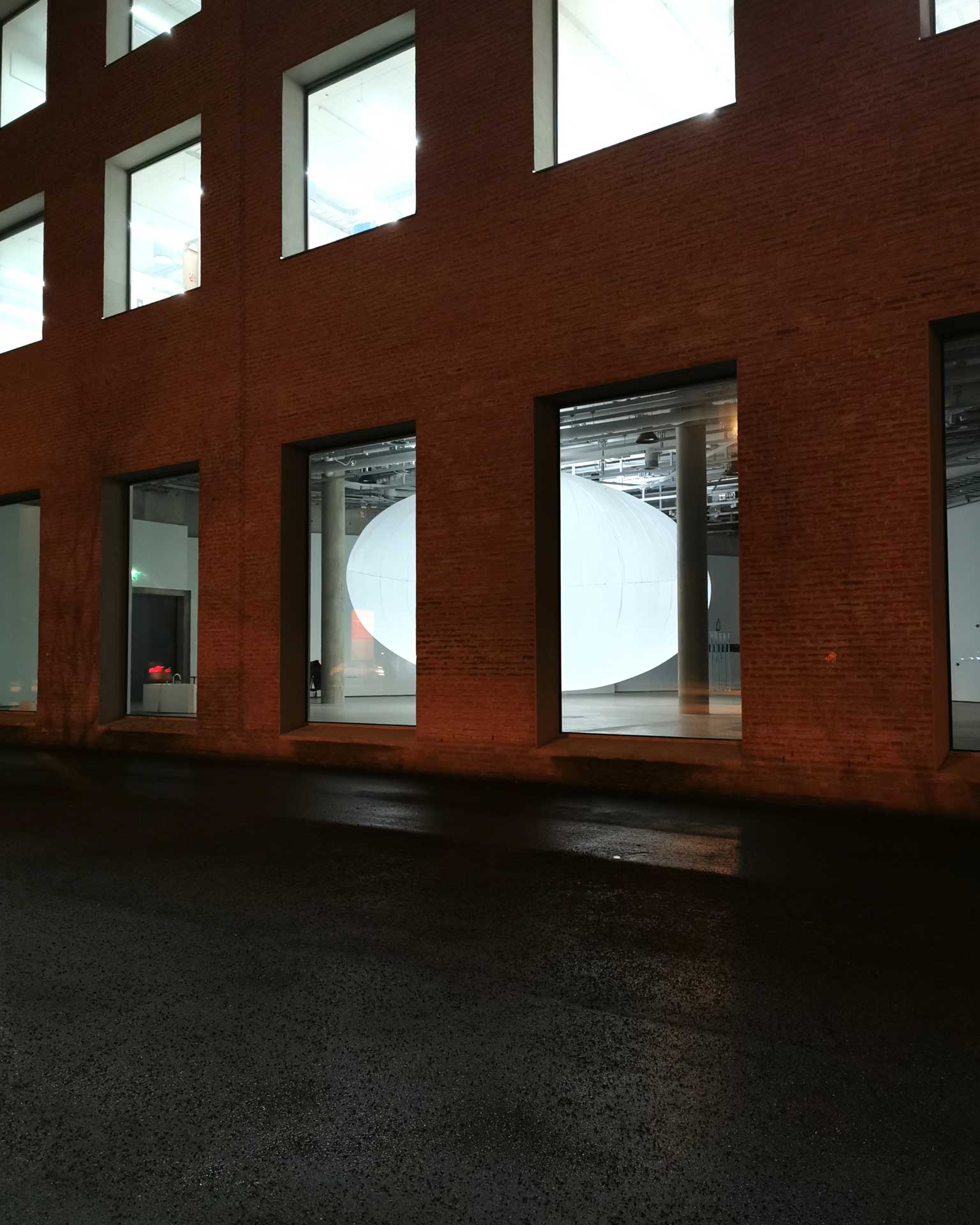 Pneumatic Cloud: view from outside through window at night